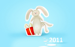 3d обои Кролики с новогодним подарком и надпись 2011  кролики