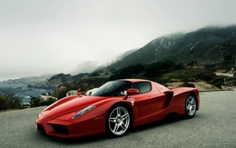 3d обои Ferrari Enzo на фоне гор  вода